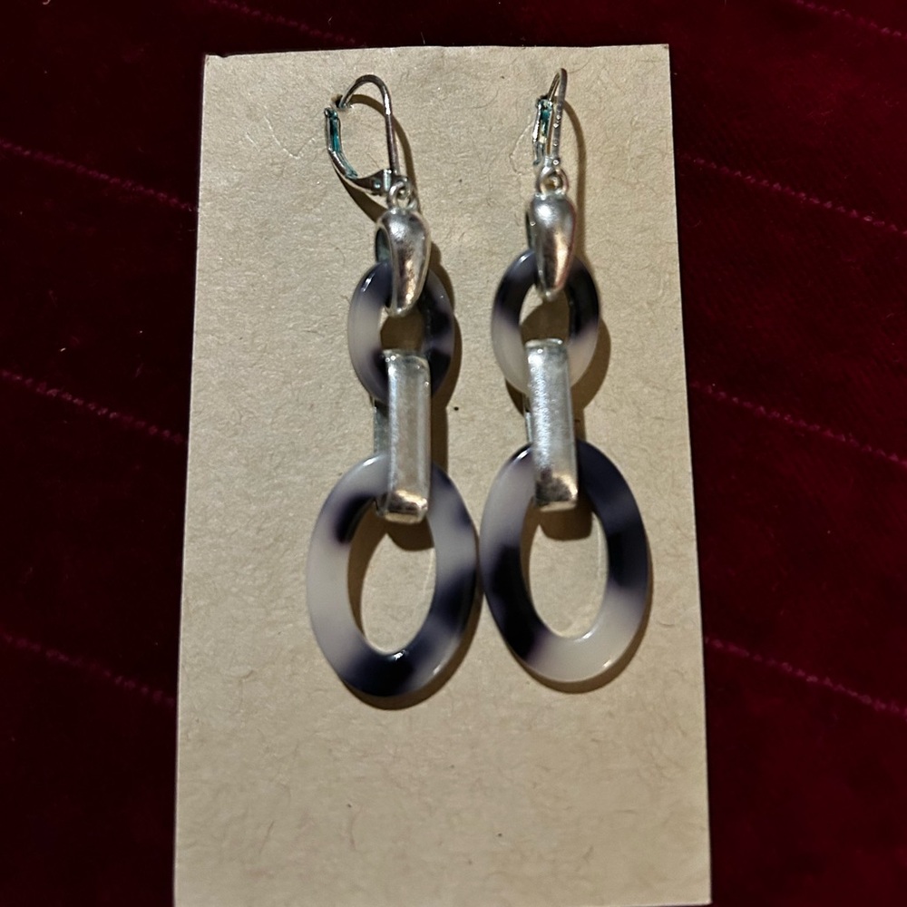 Classic silvertoned black/white tortoise shell print Earrings.